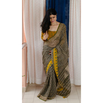 Hand block printed and natural dyed kota doria saree with natural dyed Ajrakh patch work border and tassel.