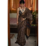 Handwoven and handblock printed tussar silk saree.