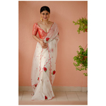 Handloom handembroidered resham silk saree enhanced with beads scallops.