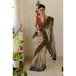 Hand block printed natural dyed kota doria saree with natural dyed Ajrakh patch work border and tassel.