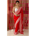 Handloom katan Banarasi silk saree with woven motifs.