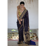 Handloom chiffon khaddi banarasi saree with silver jari booti.