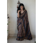 Handloom tussar silk saree in natural dyed handblock print.