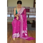 Handwoven chiffon banarasi saree with handwoven silver jari motifs.