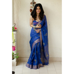 Handblocked printed handloom linen by linen saree with goldsilver zari border.