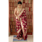 Handloom katan Banarasi silk saree with woven motifs.