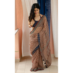 Hand block printed and natural dyed kota doria saree with natural dyed Ajrakh patch work border and tassel.
