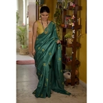 Handwoven and hand embroidered tussar silk saree.