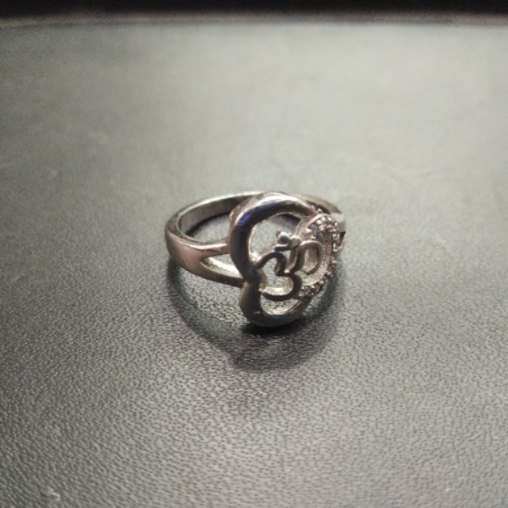 important silver om ring
