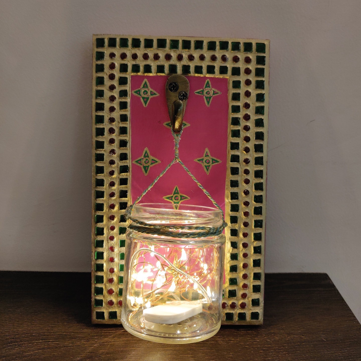 Wooden wall decor with a glass jar and LED lights Diwali special