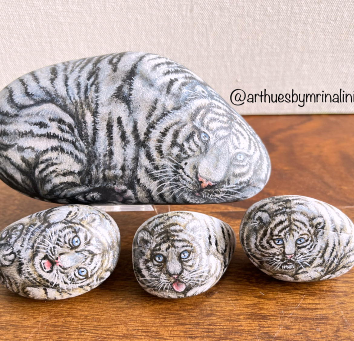 Resting Tigress mother and the playful cubs hand painted painted stones set of 4 rocks