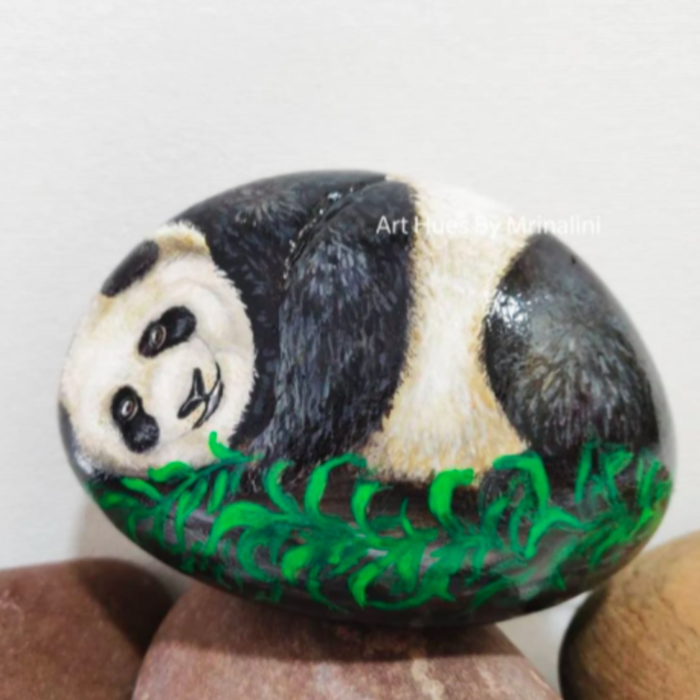 Original Baby Panda playing on a rock hand painted on a rock stone art