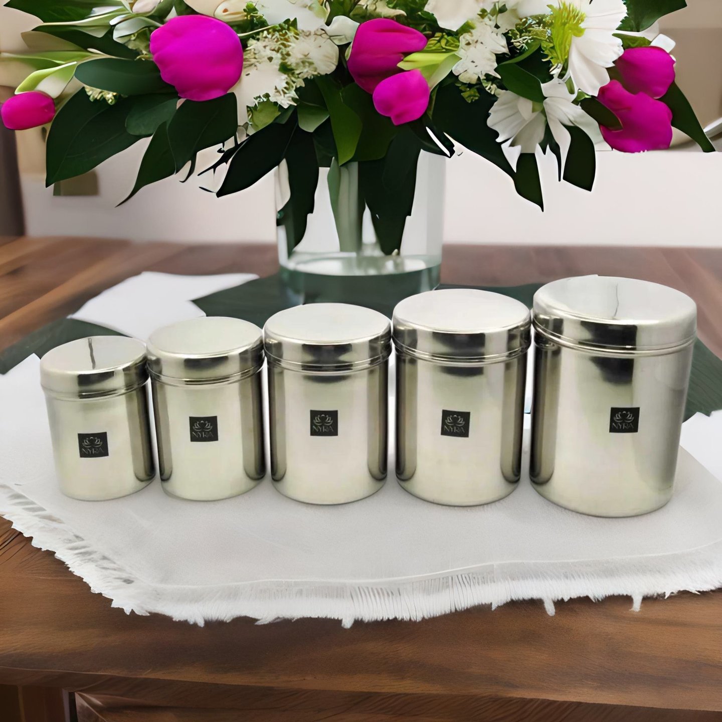 Nyra Stainless-Steel Cylindrical Shaped Deep Storage Box Containers DibbaDubba Set of 5 capacity from 800 ML to 2.6 ltr