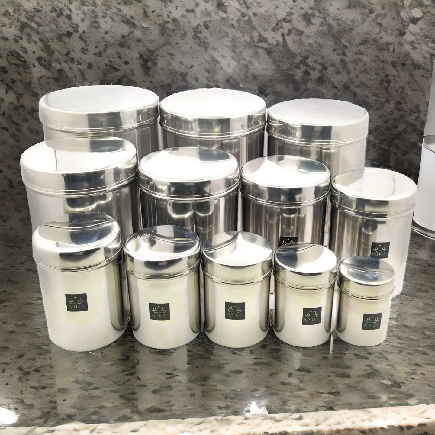 Nyra Stainless-Steel Cylindrical Shaped Deep Storage Box Containers DibbaDubba Set of 12 capacity from 300 ML to 6 ltr