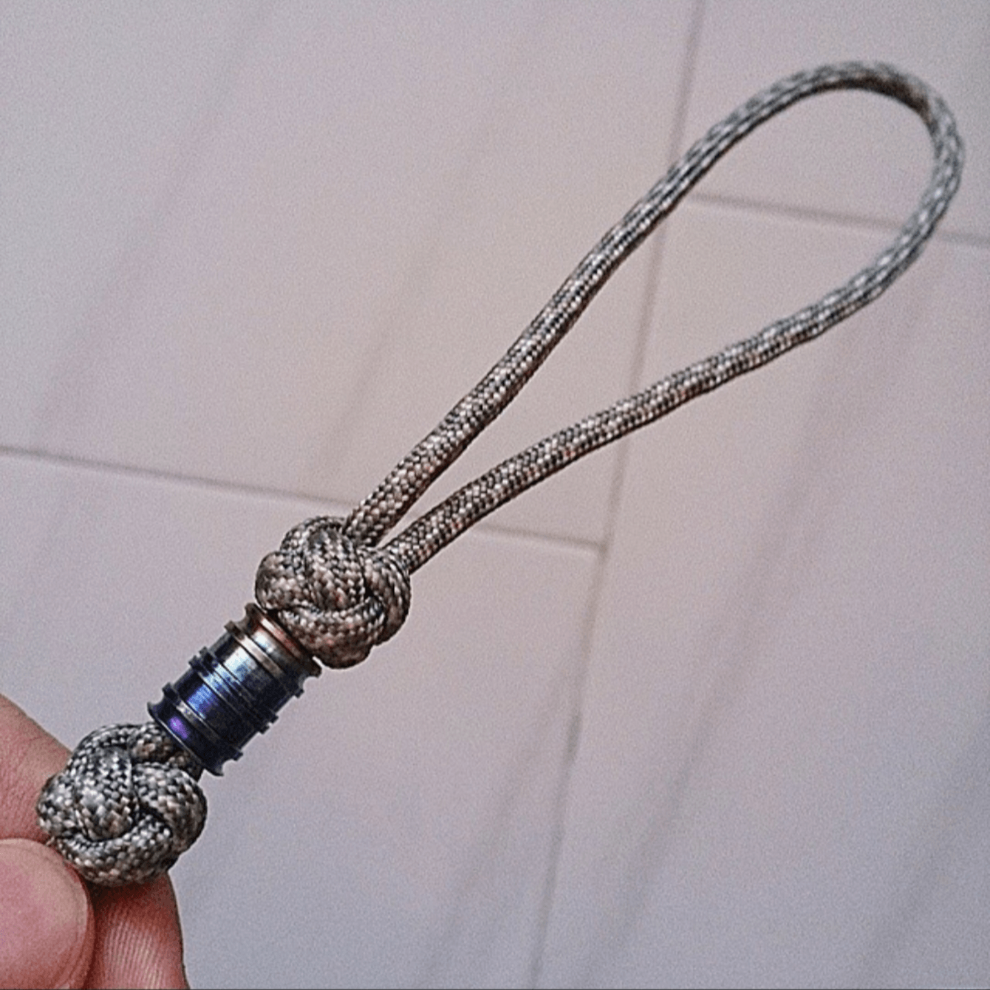 Paracord keychain with Titanum bead