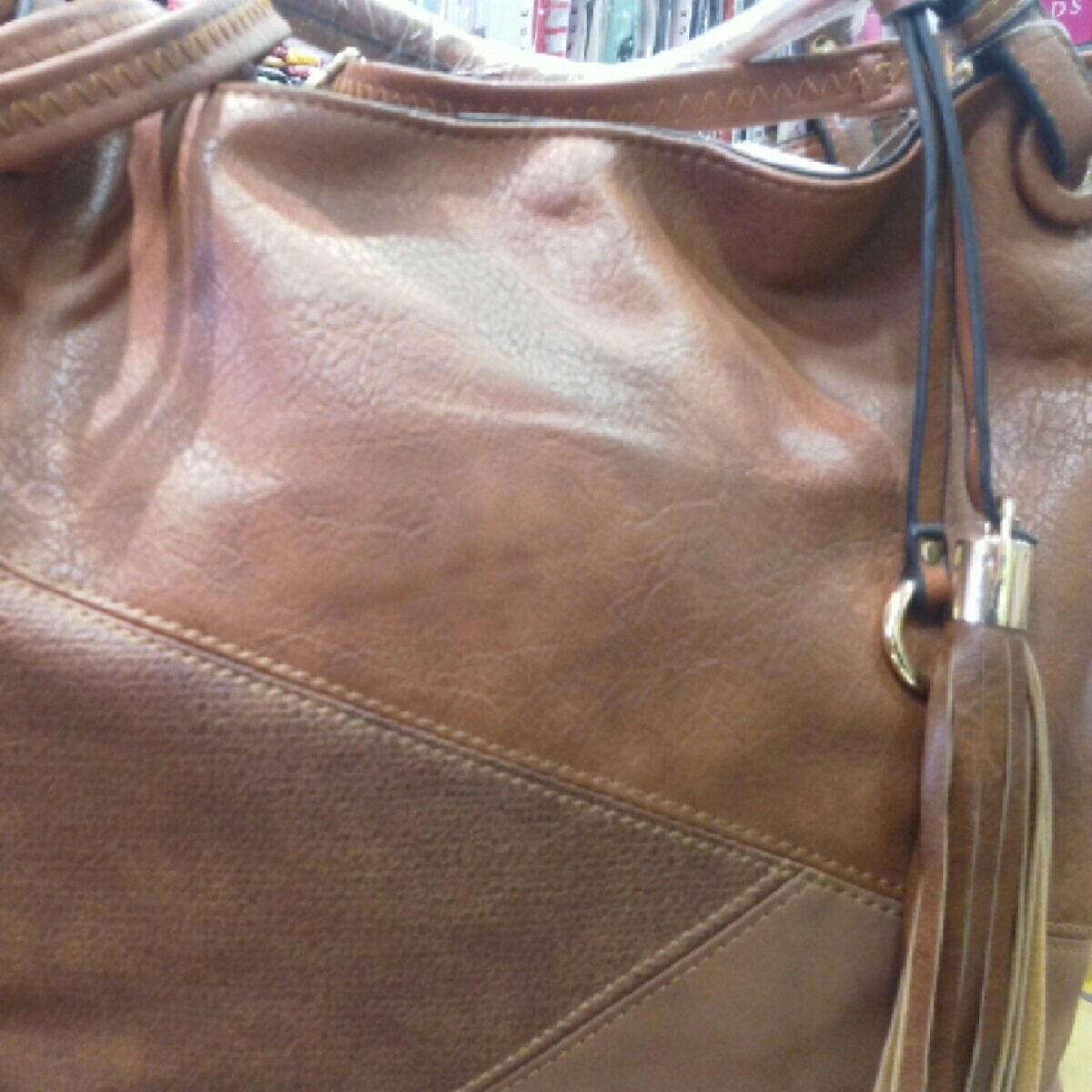 Dark brown colour handbag Ellegence brand for women.