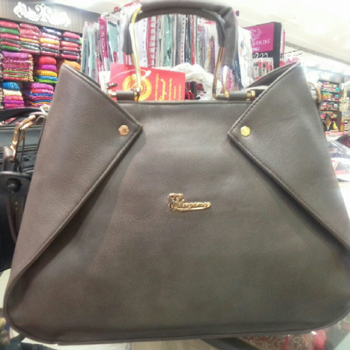 Grey colour handbag Ellegence brand for women.