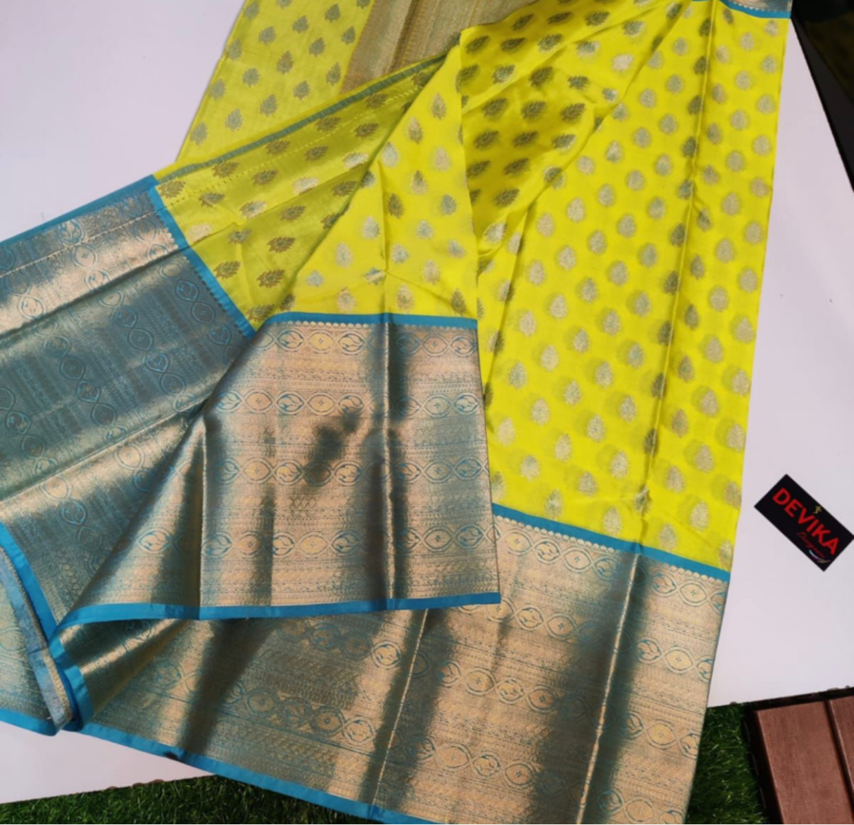 Lemon shade with blue border designer saree