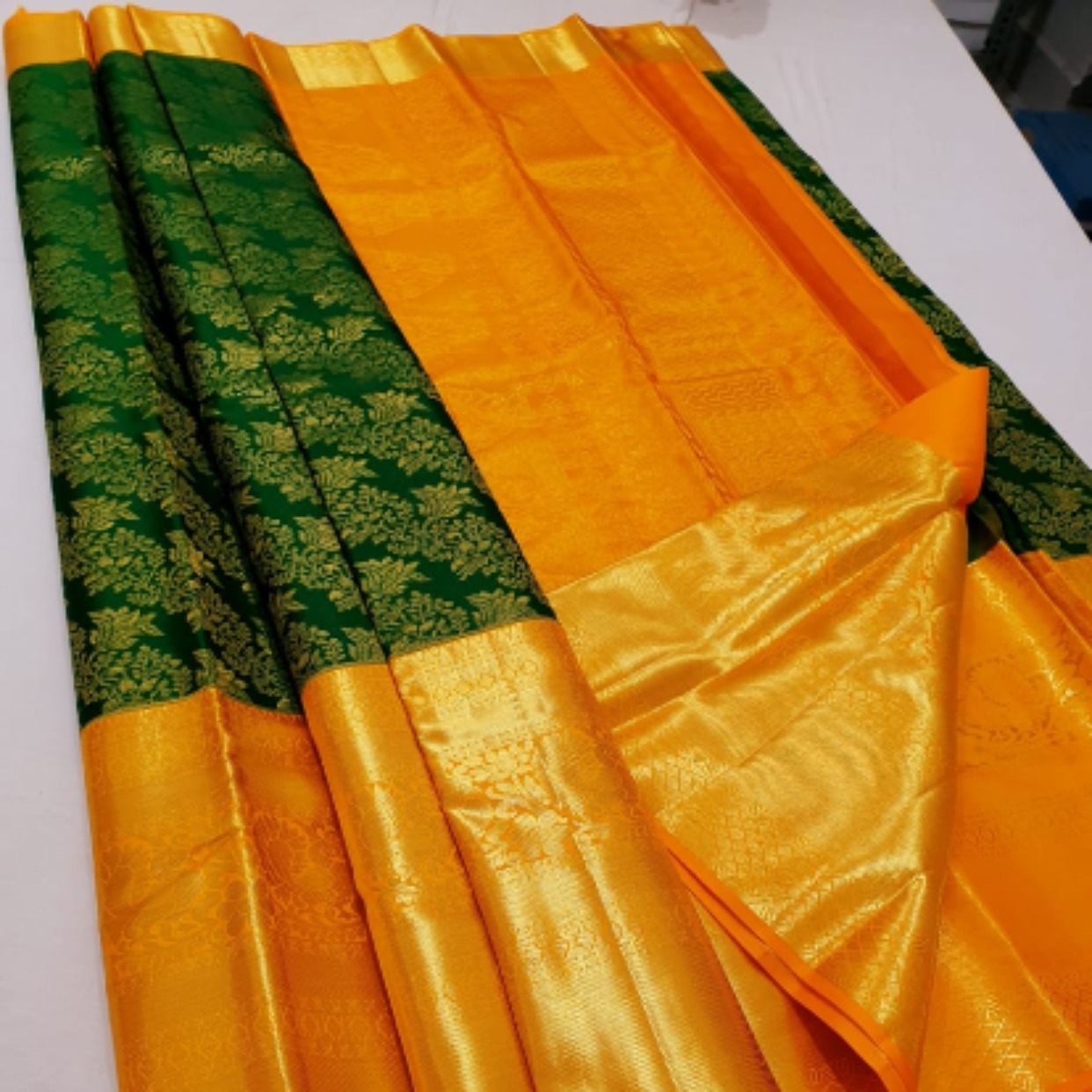 Bottle Green with orange border Kancheepuram silk saree