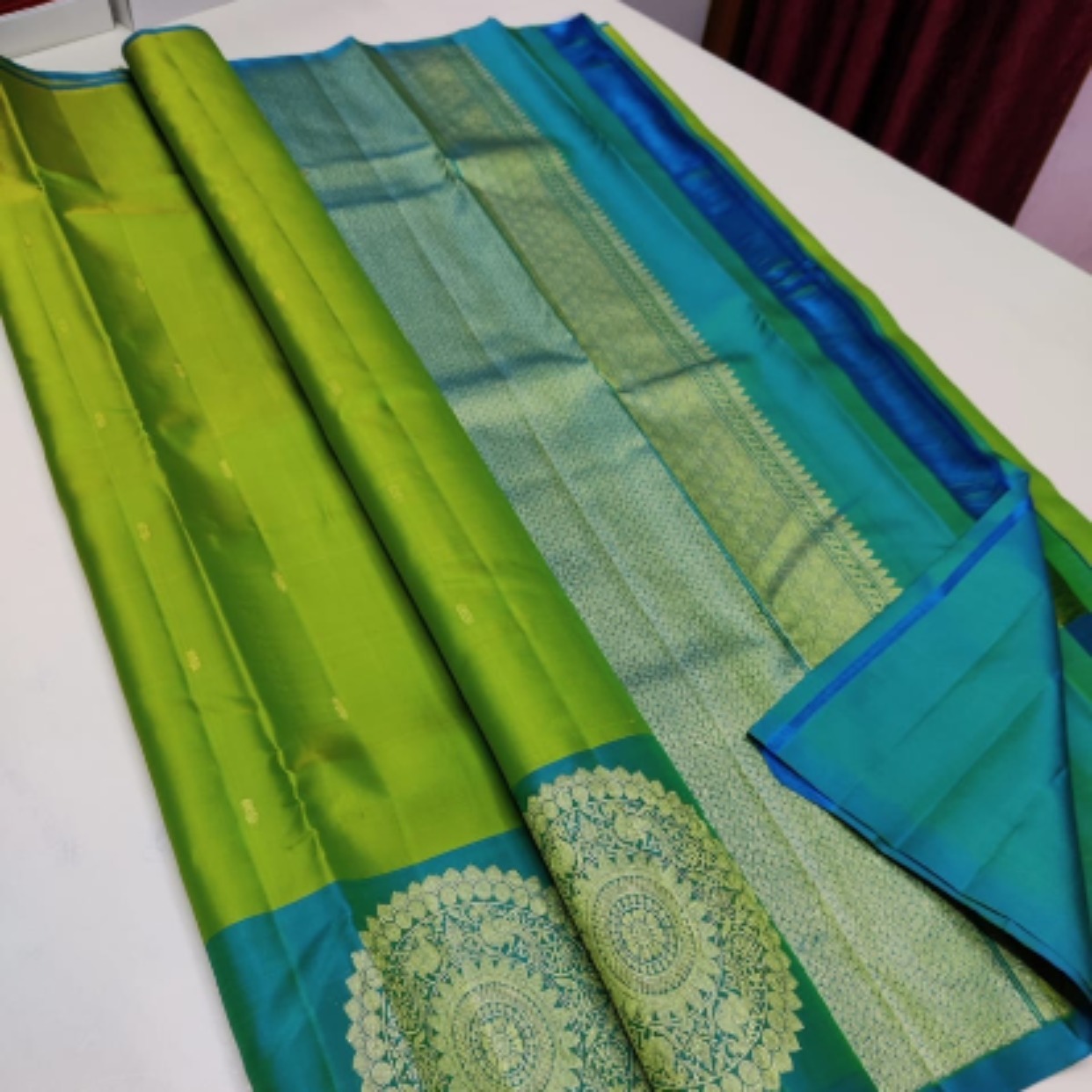 Green Kancheepuram silk saree with teal shade border 2g zari