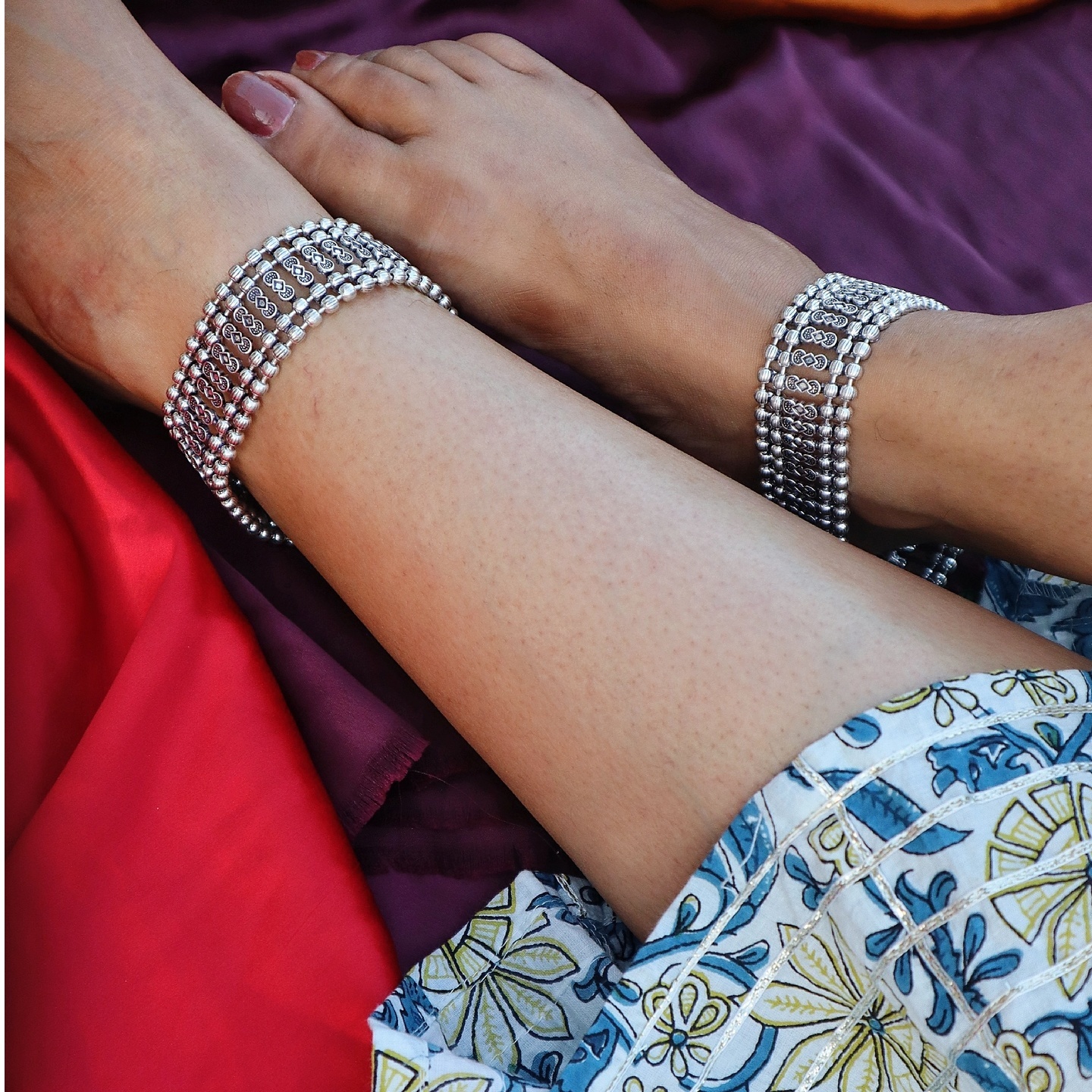 Silver anklet with broad borders