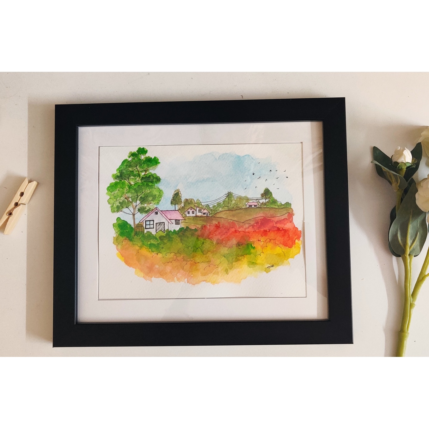 ‘Vibrant village’ – Framed ink and wash illustration of village (A5 size paper)