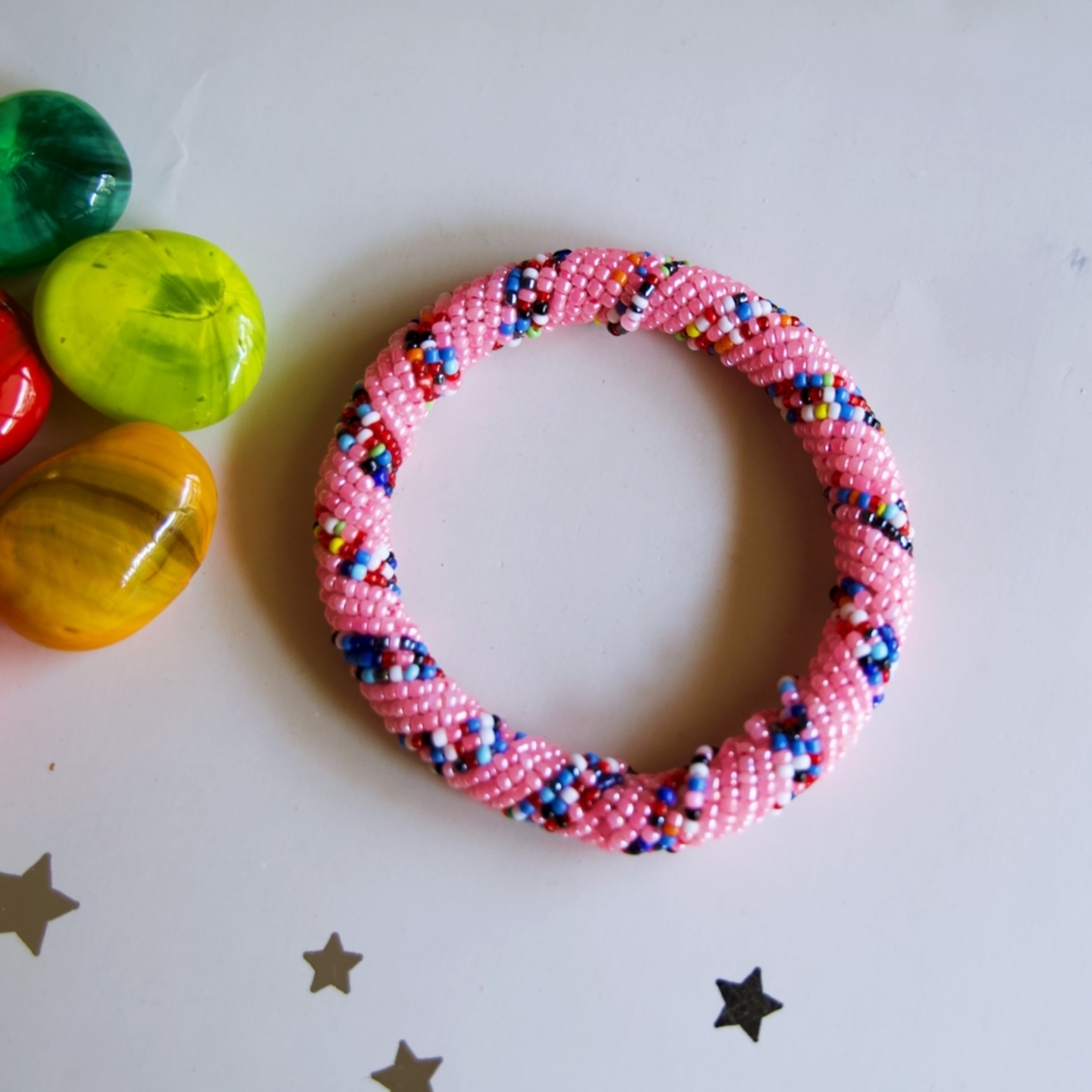 Pink and multicolour beaded bangle