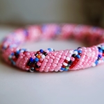 Pink and multicolour beaded bangle