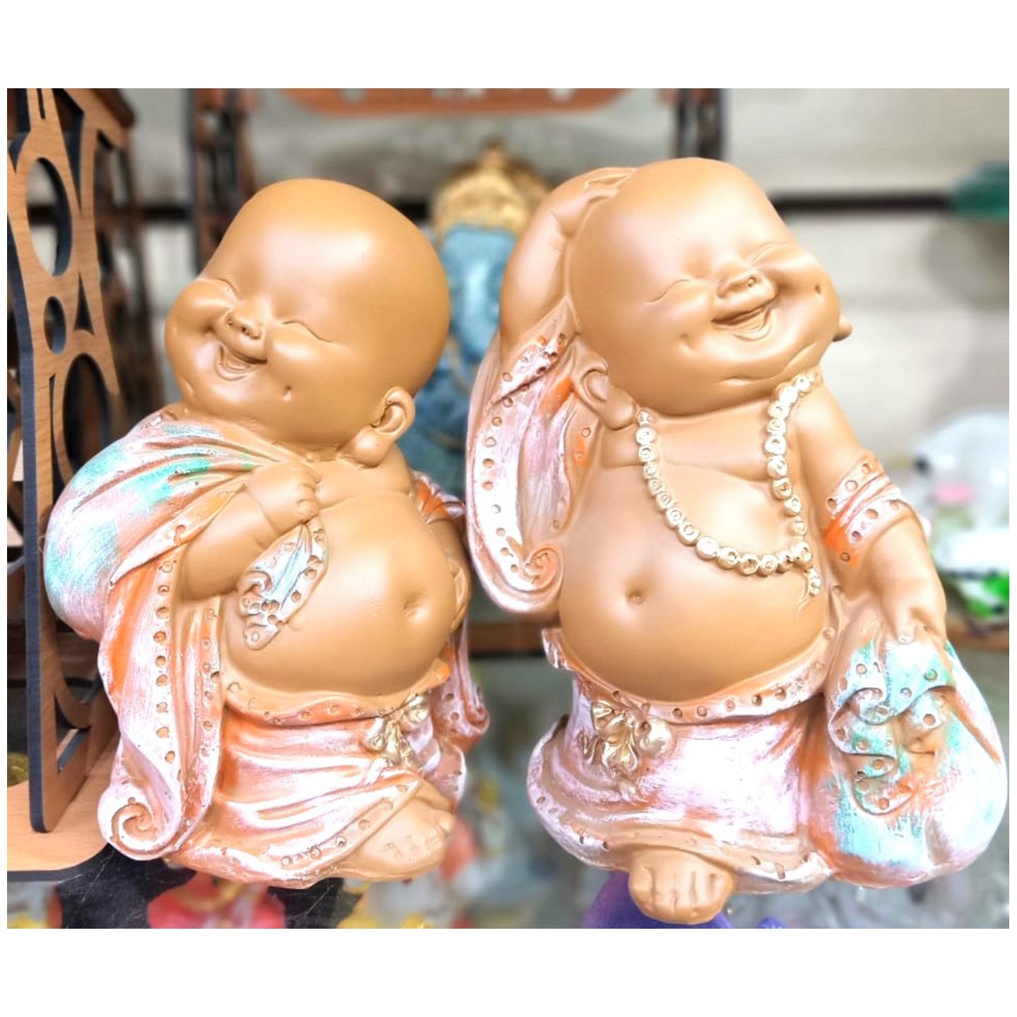 Deesha Planters and Decors Potli Laughing Buddha Set Showpiece 12X9X18 cm per Piece