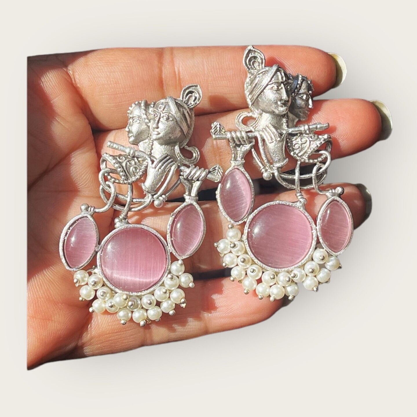 Radha-Krishna love inspired earrings.