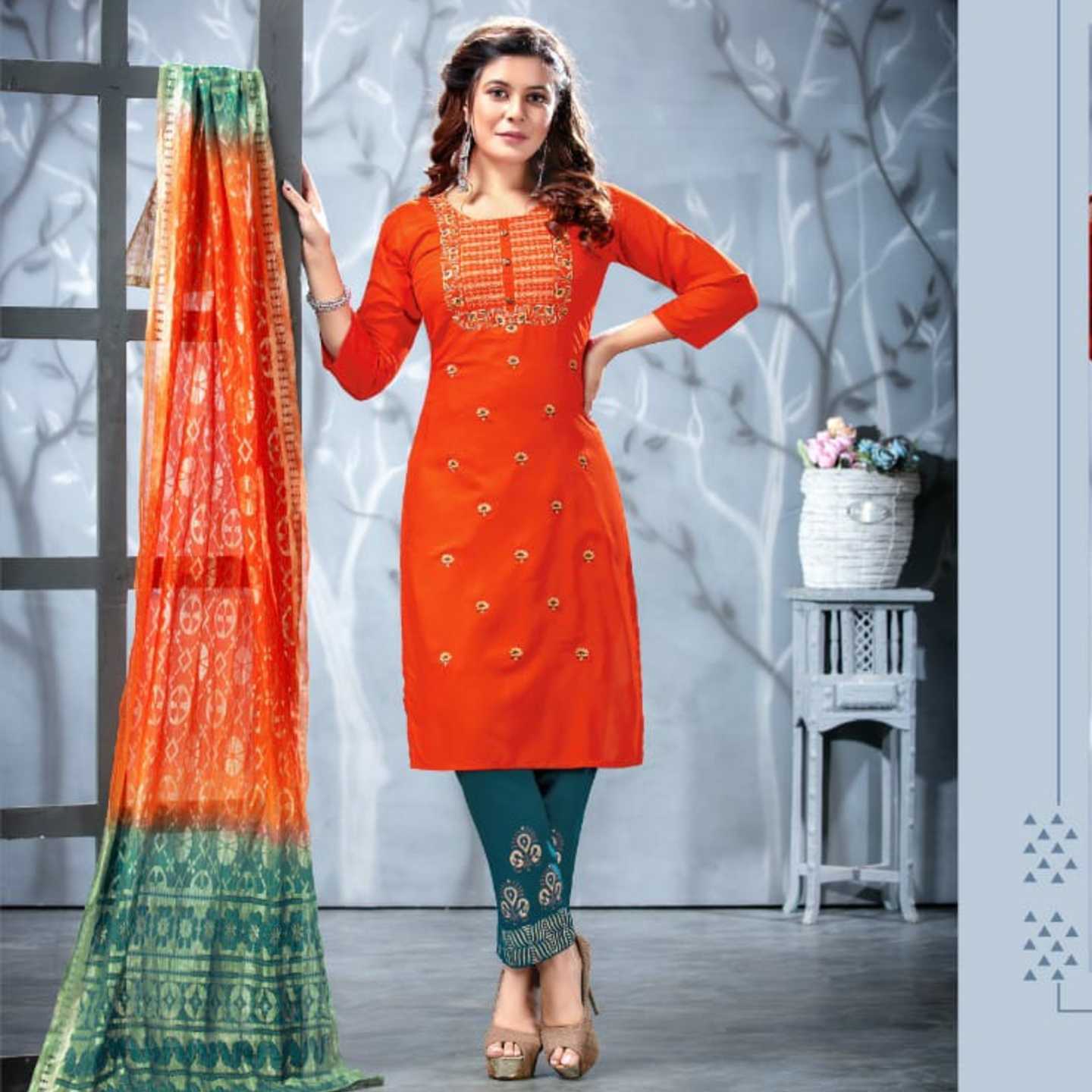 Kinti Presents Women Orange & Blue Color Embroidered Kurta with Trousers & Dupatta