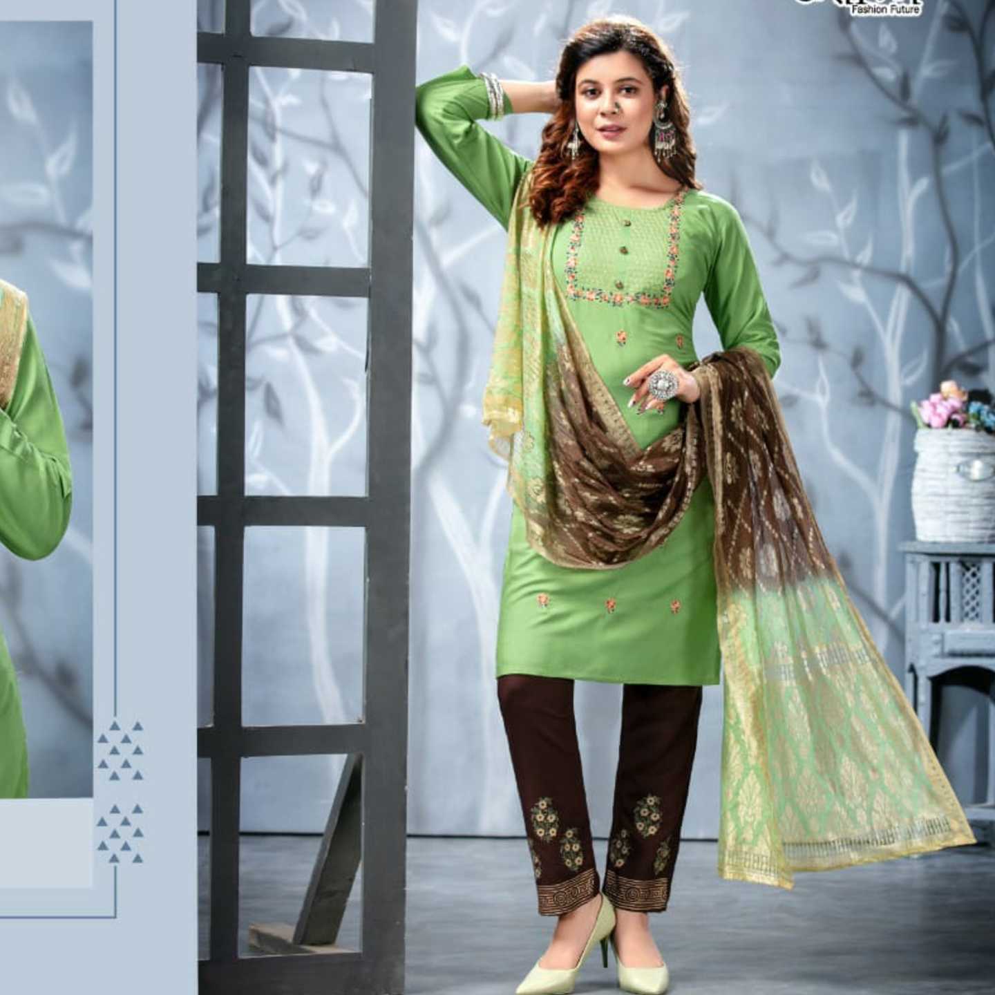 Kinti Presents Women Pistachio Green Color Embroidered Kurta with Trousers & Dupatta
