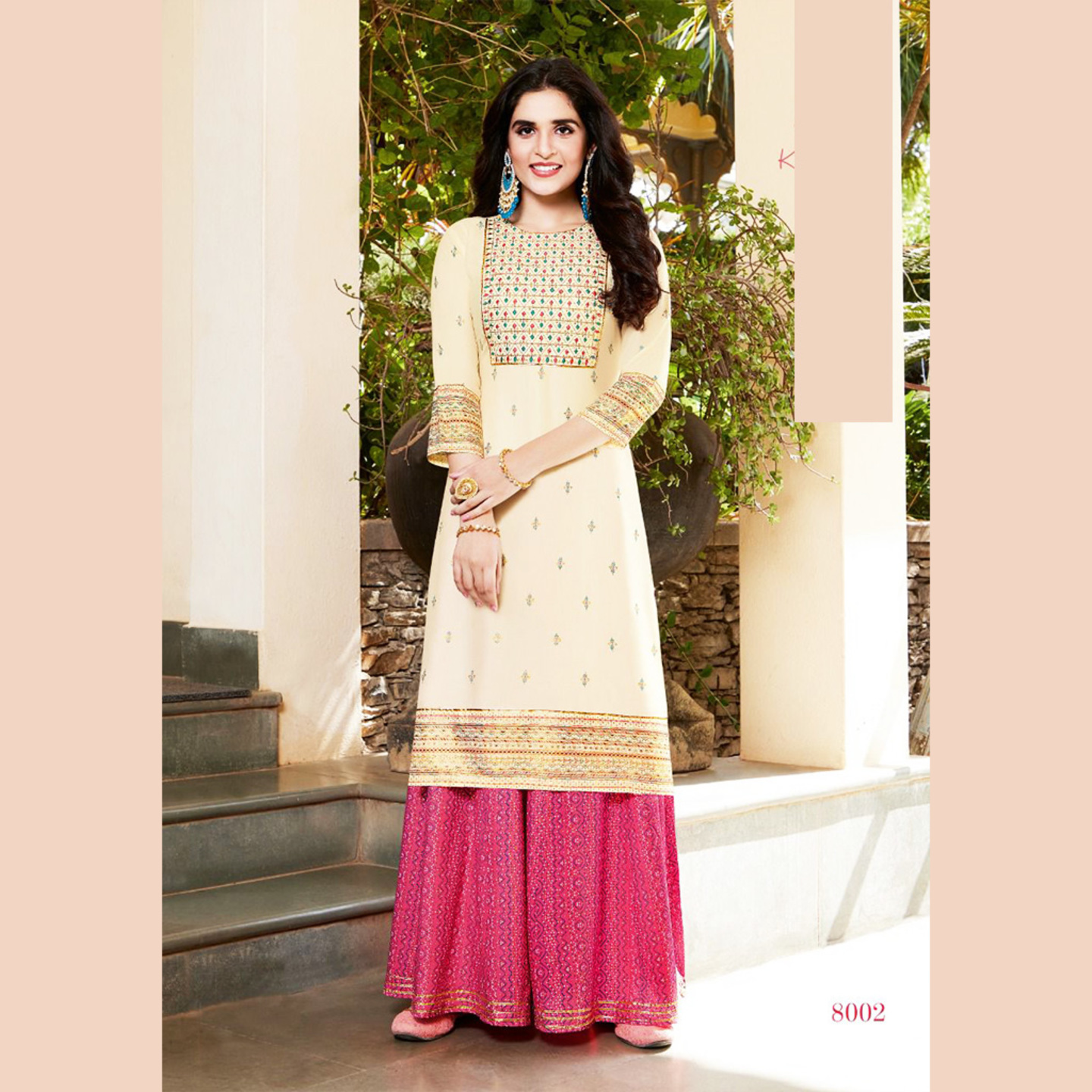 Talk By Fashion Women Embroidered Kurti with Flared Palazzo Set