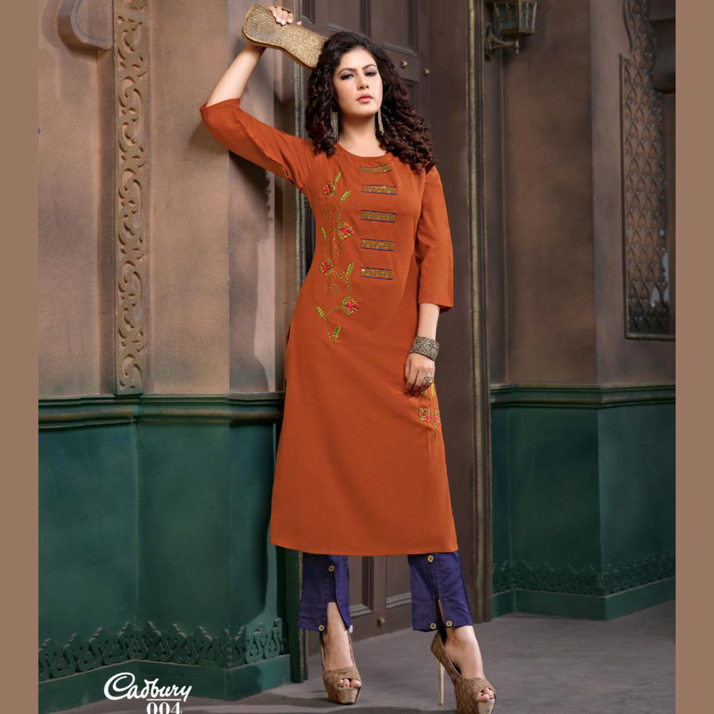 Women Embroidered Solid A-line Kurta with Pants