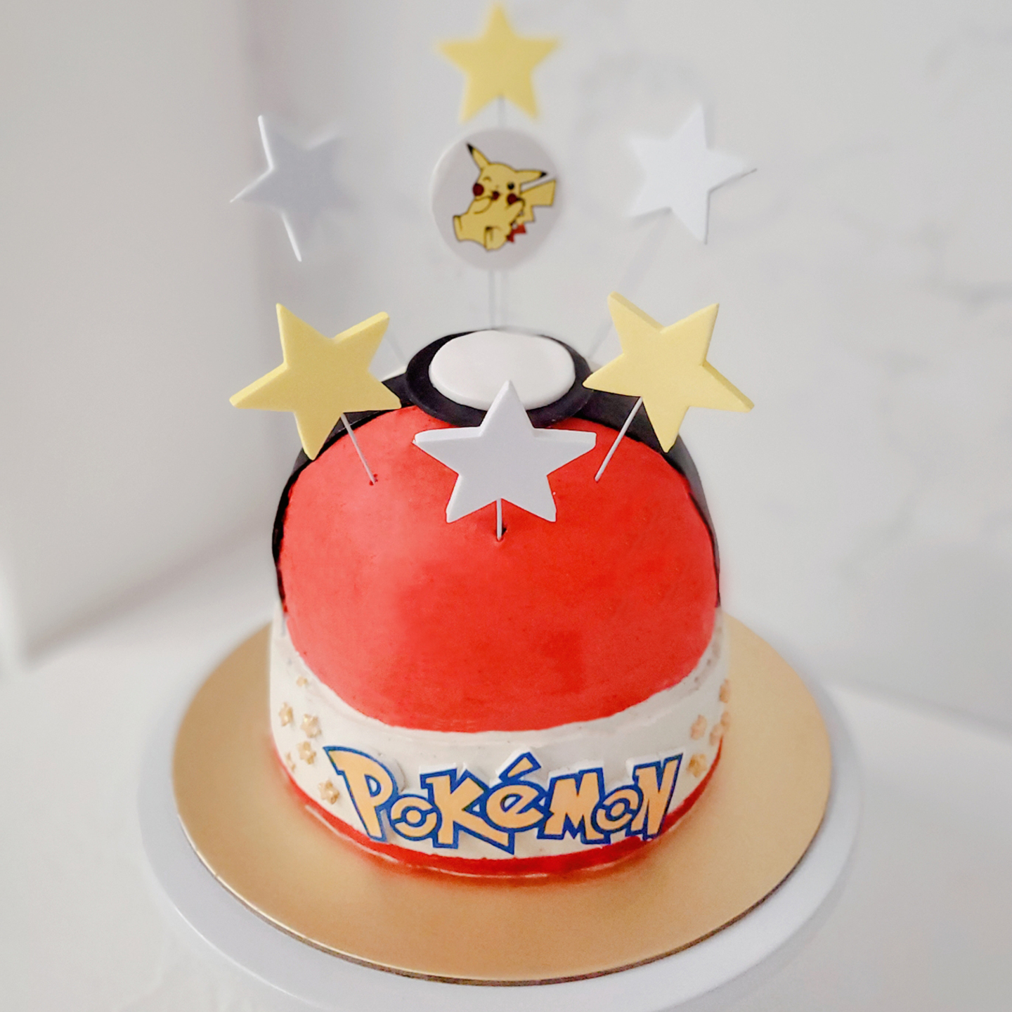 Pokeball Cake With Decorative Toppers 