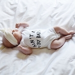 AINT NO CRY BABY Unisex Bodysuit