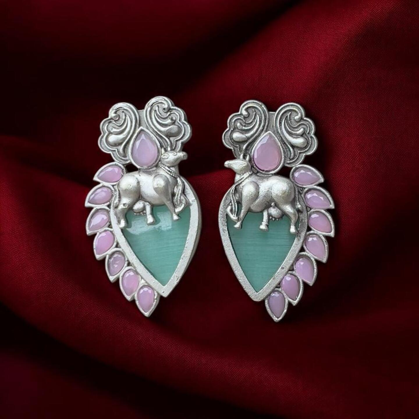Silver cow earrings