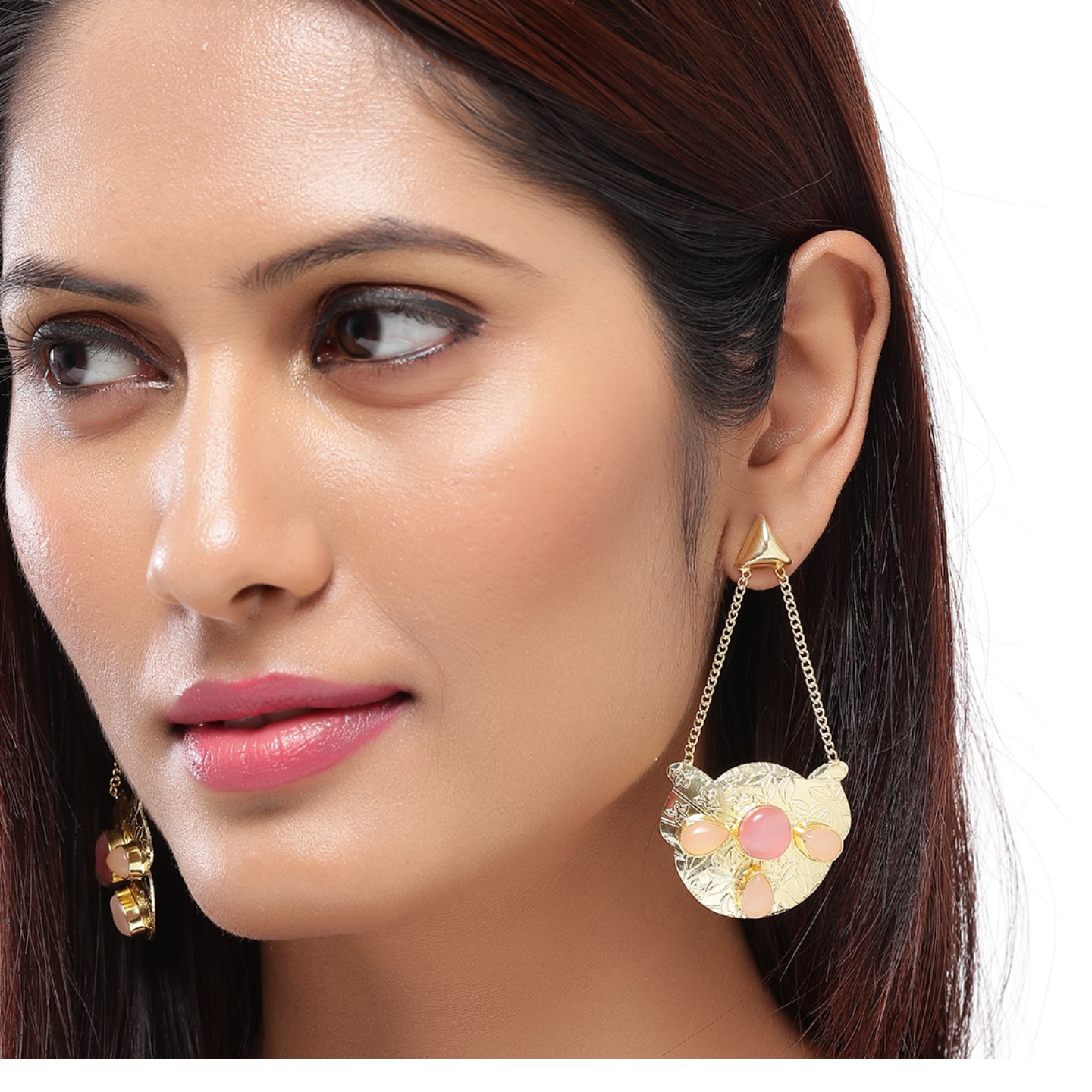 Triangular gold earrings with pink stones