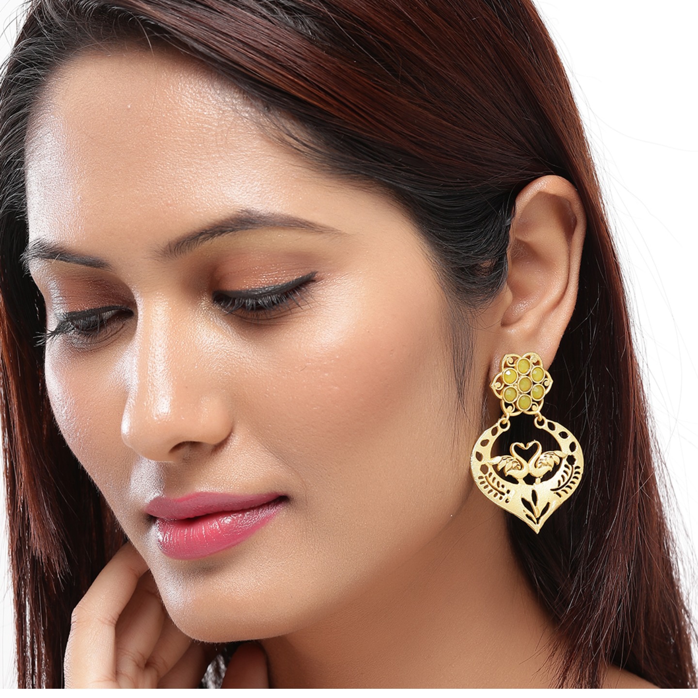 Ethnic gold earrings with yellow stones