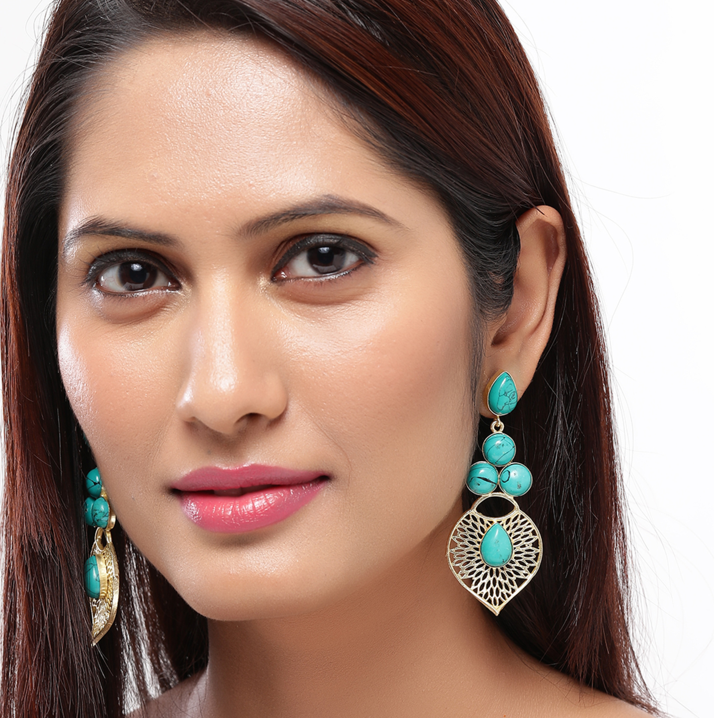 Stylish leaf shaped earrings with turquoise stones