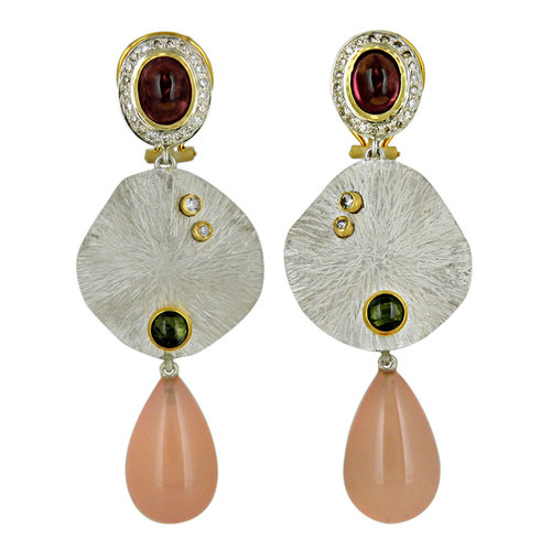 An impressive mix metal textured earrings with gemstones.