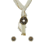 An opulent knotted keshi pearl necklace ,matching earrings and ring, made with embroidered precious elements