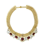 A Grand Parure in Ruby, Un-cut Diamonds and diamond in yellow gold