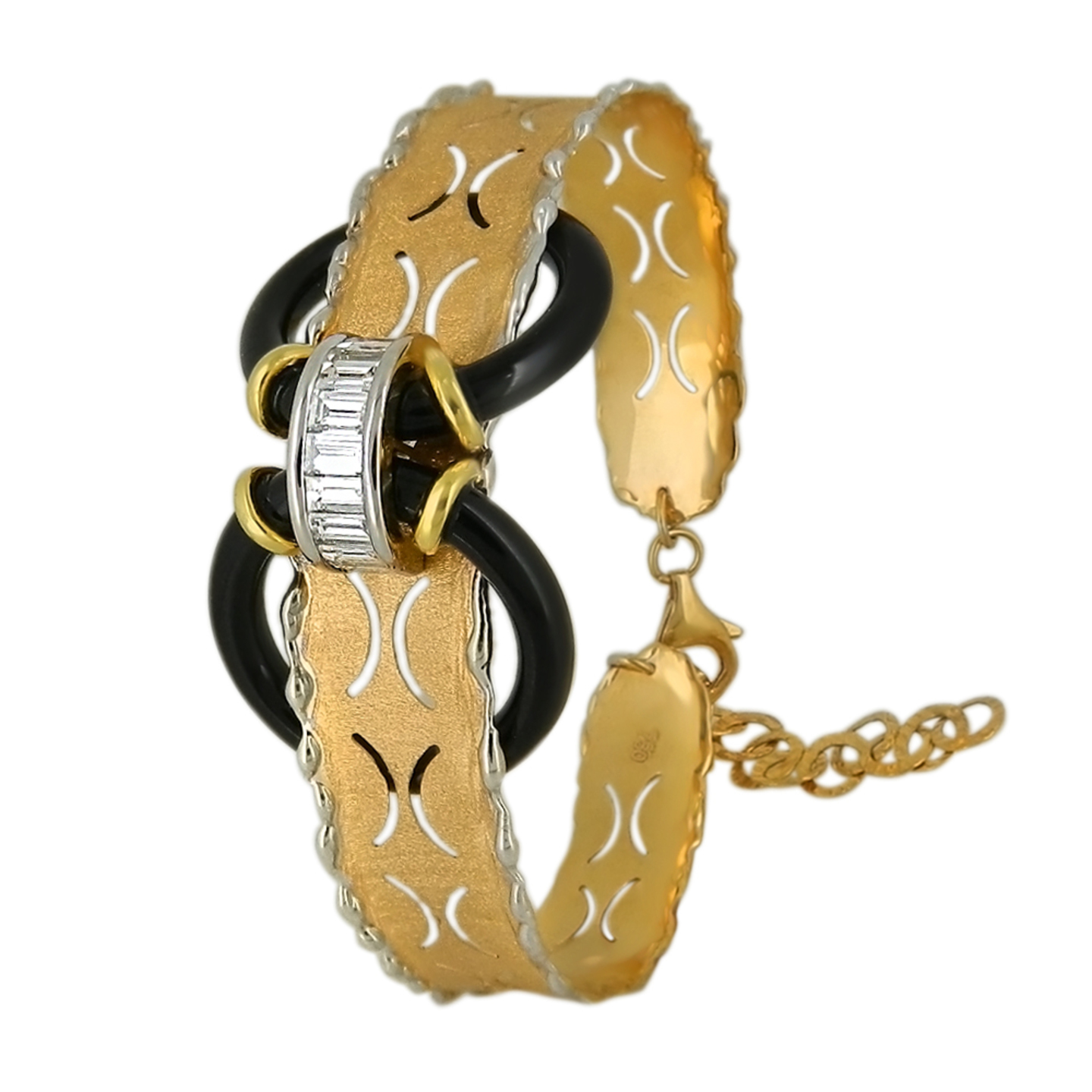 A stylish textured matte Italian gold bracelet with unusual placement of gemstones