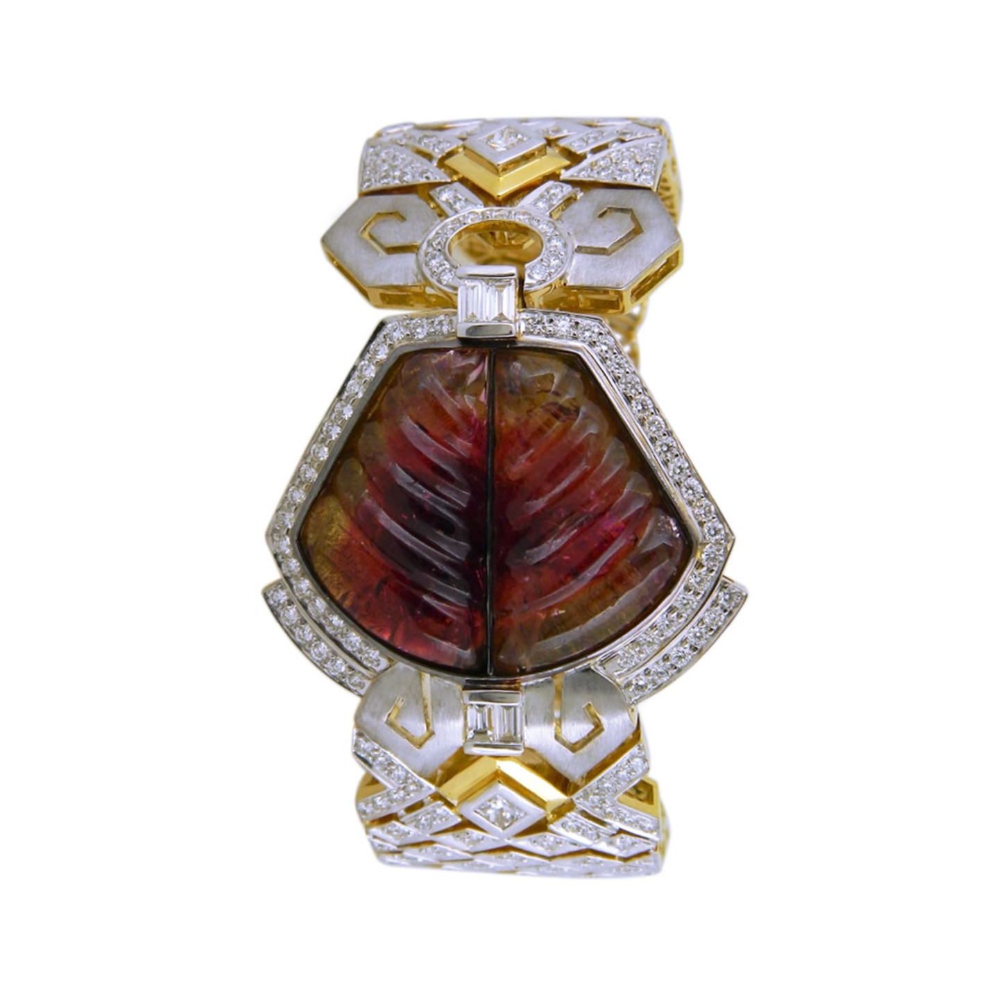 A broad diamond Tourmaline bracelet with geometric inspired filigree, in mix hues of gold