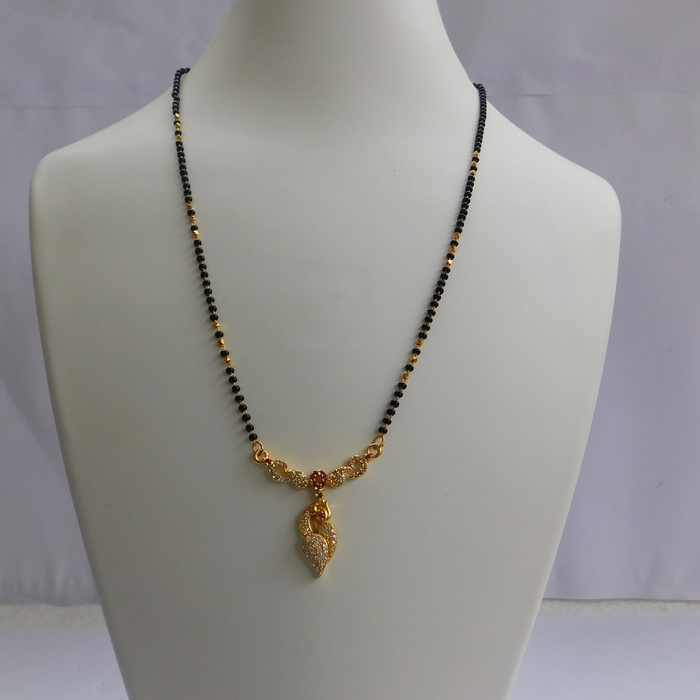 Black Beads chain with Gold Plated Locket 