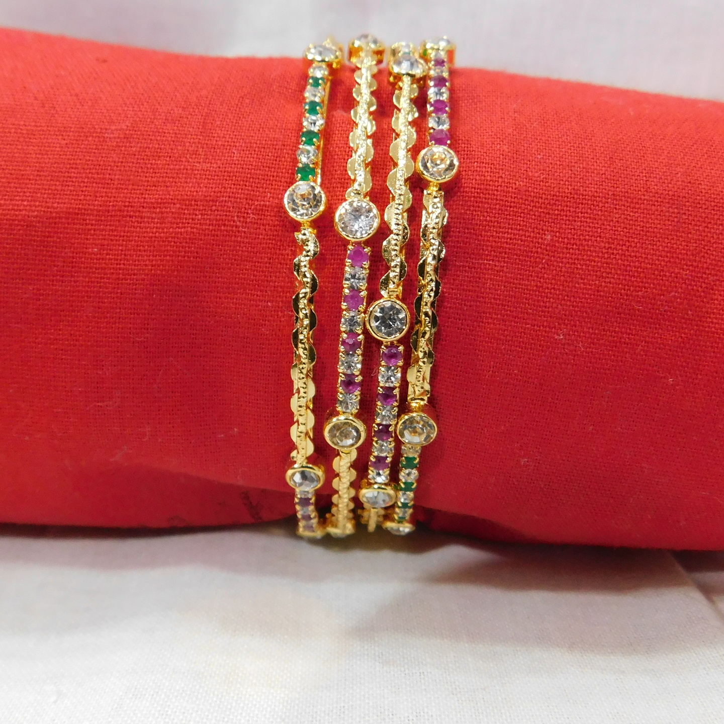 Set of Four  Bangles  - CZ ,Ruby & Emerald stones 