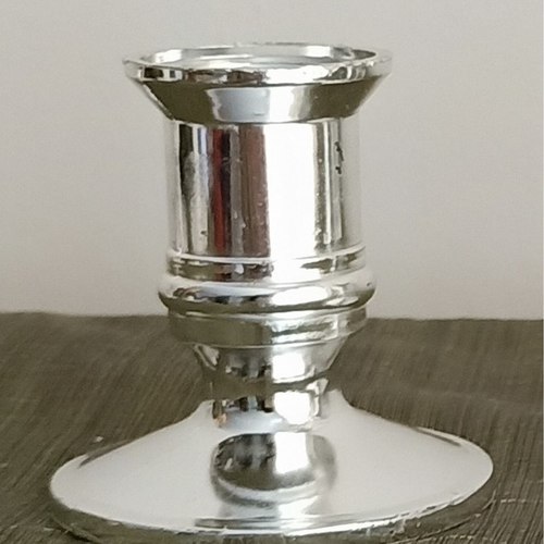 PAIR OF SILVER COLOUR CANDLEHOLDERS (PLASTIC)