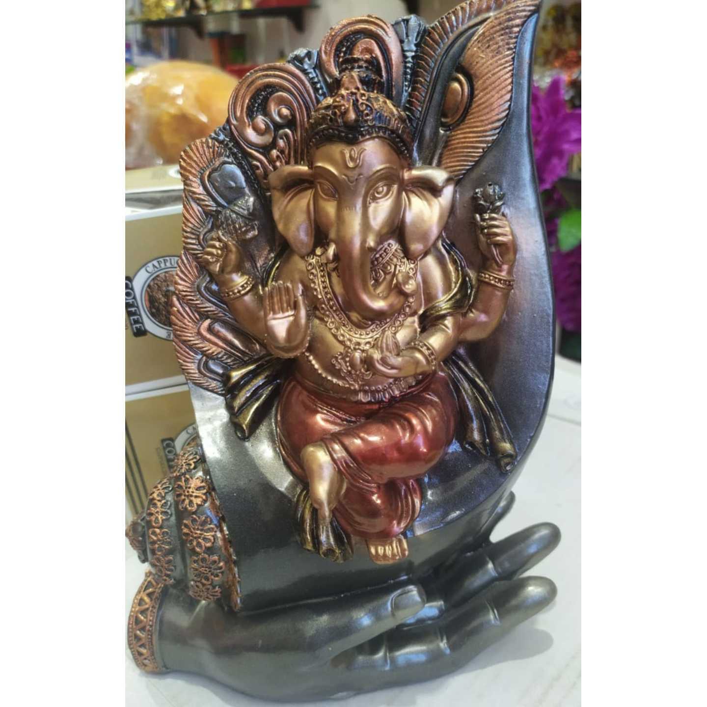  Lord Ganesha Sitting on Hand Poly resin 