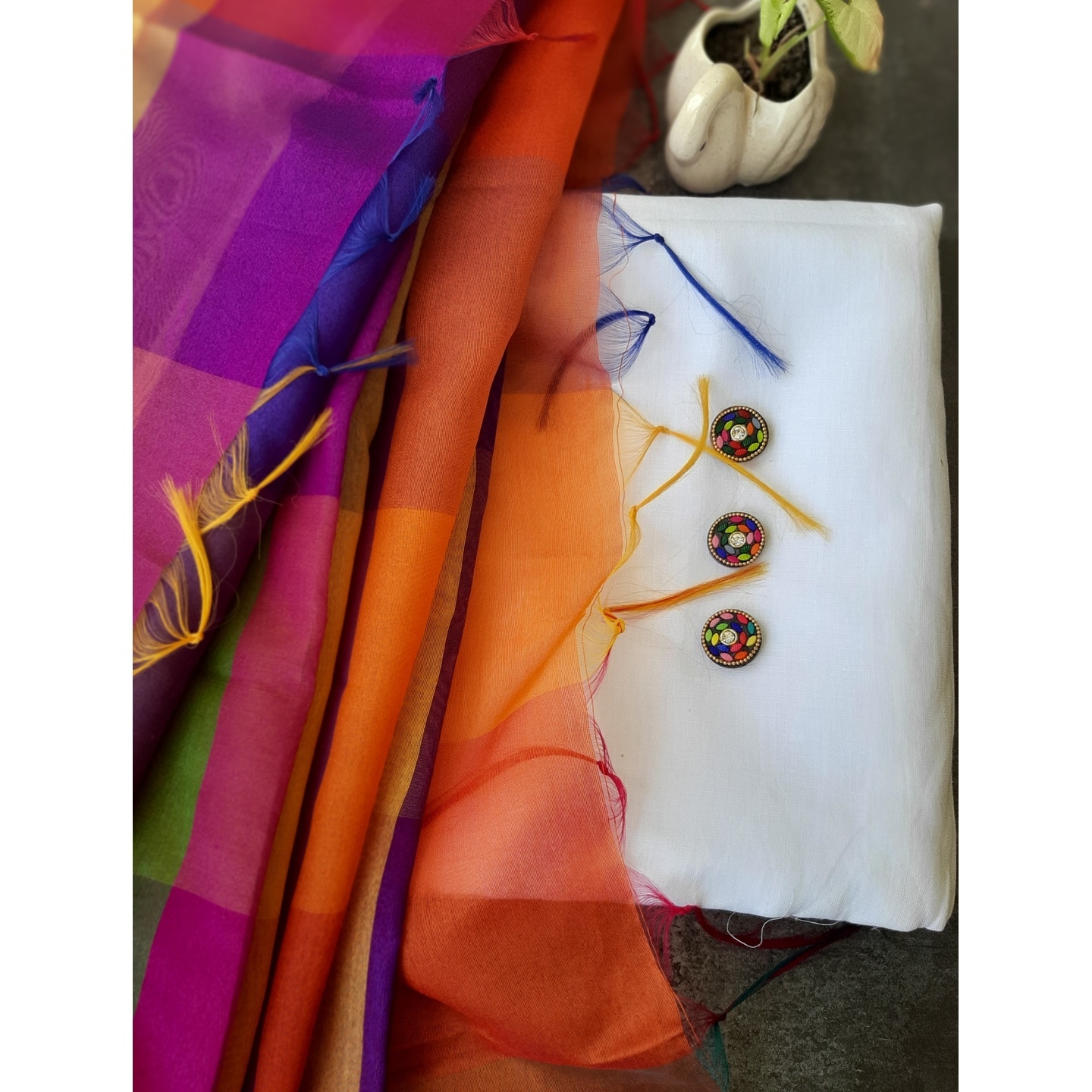 Pure white linen with multicolor dupatta &buttons